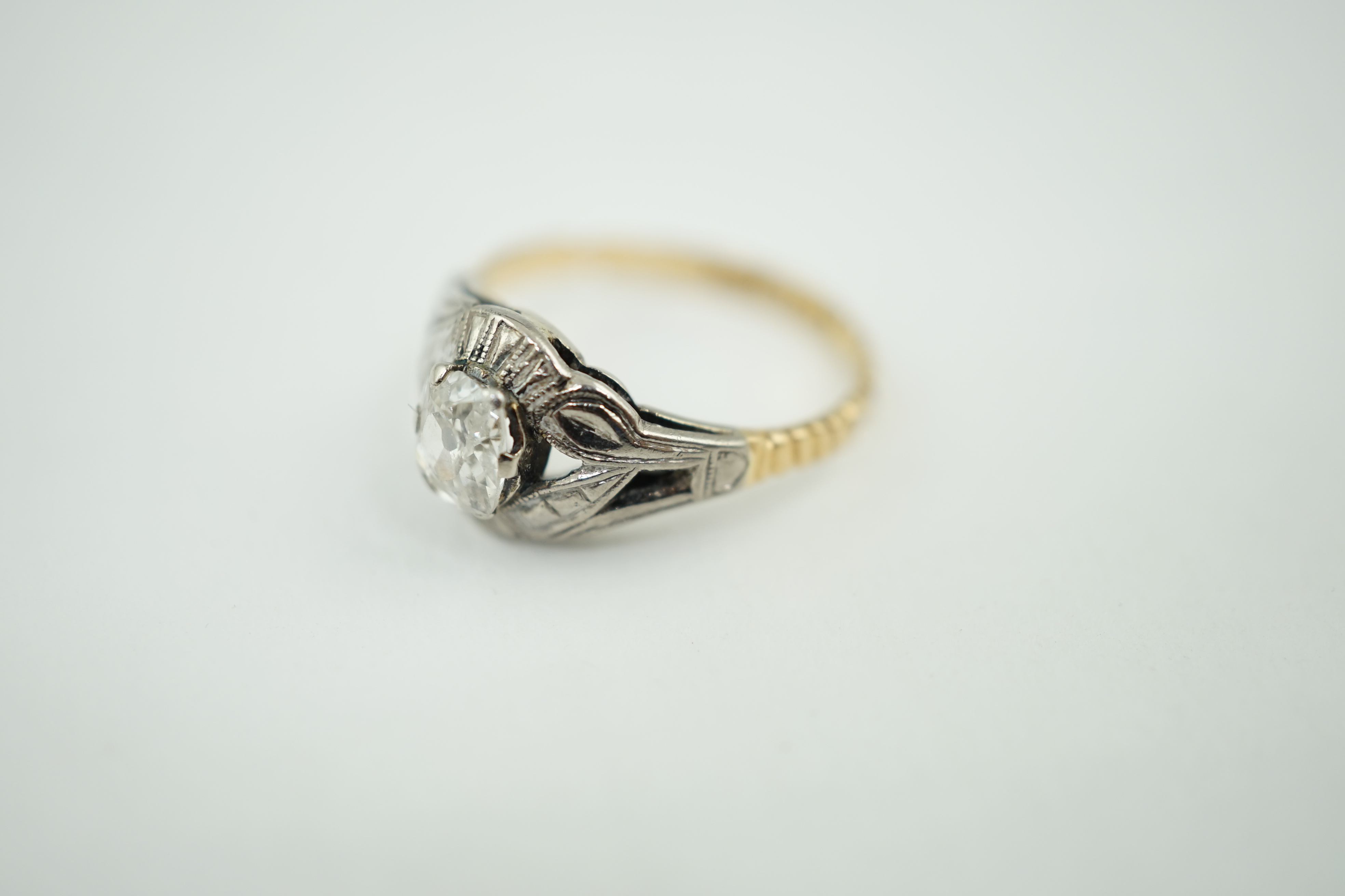 An early 20th century 18ct gold, platinum and solitaire old mine cut diamond set ring